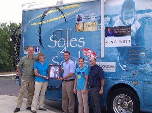 The Soles4Souls’ RV Makes a Stop at ShoeMall and Mason Companies, Inc.